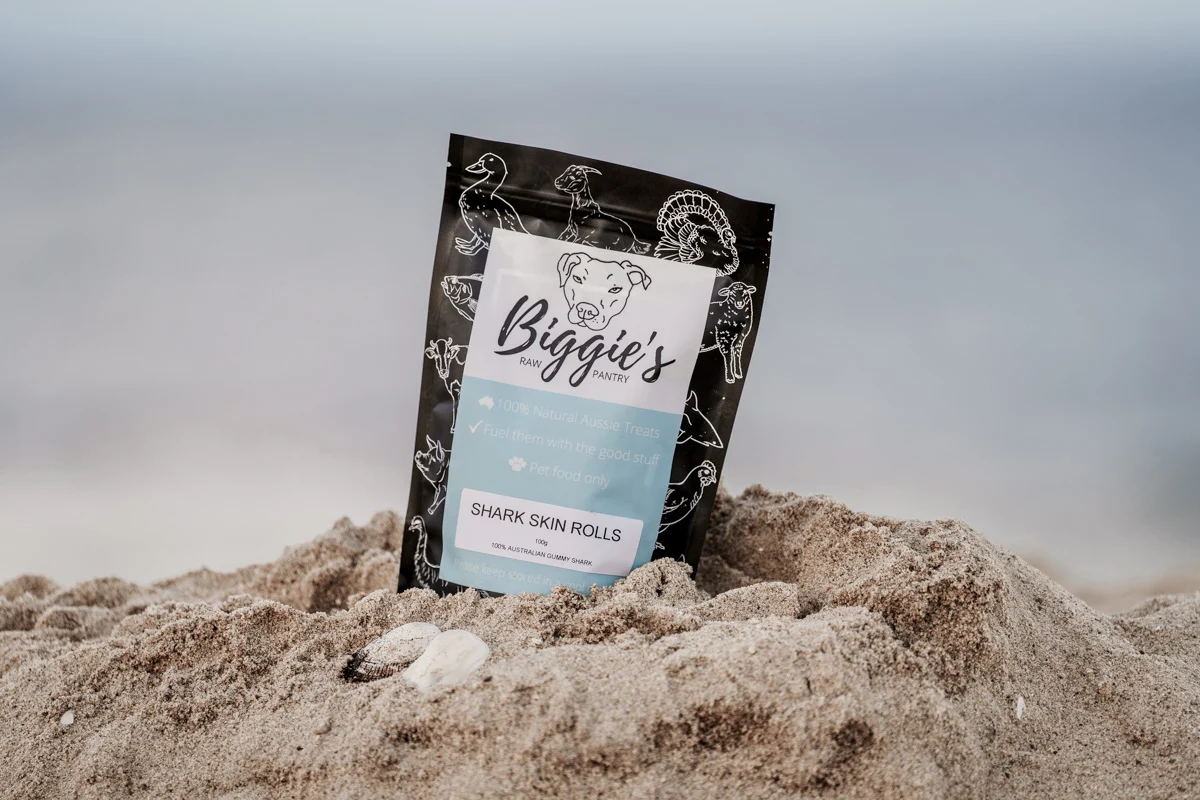 A closer look at the product packaging on the beach.