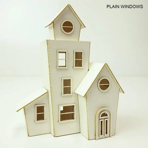 A three-storey house kit, cut flat and built up.