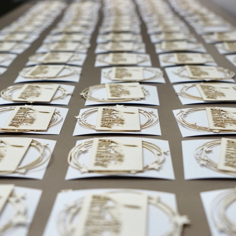 Laser-cut embellishments laid out for packing.