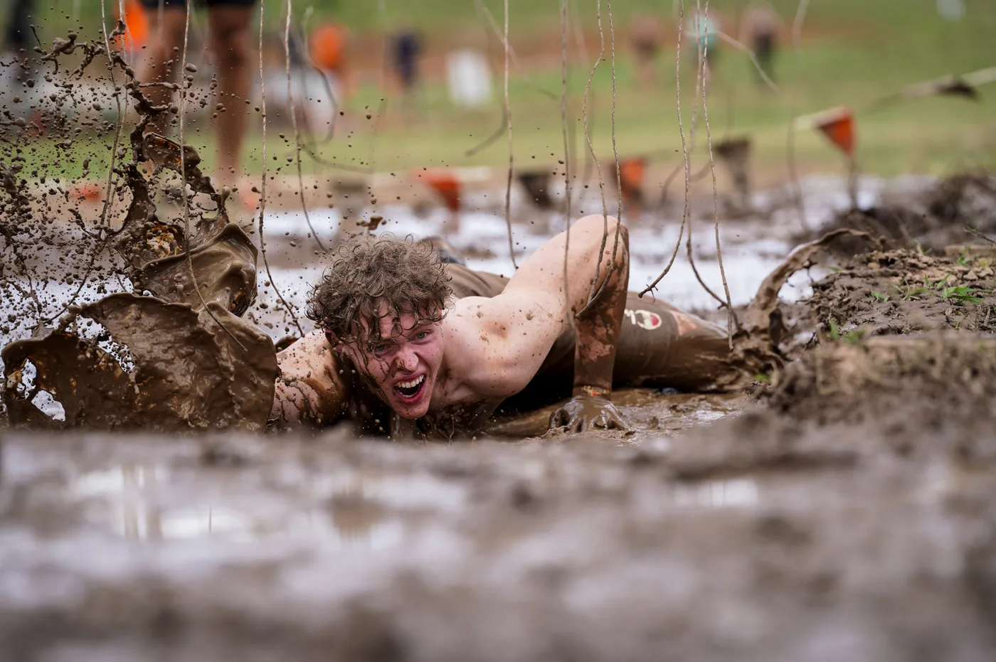 Deep in the mud at Tough Mudder.