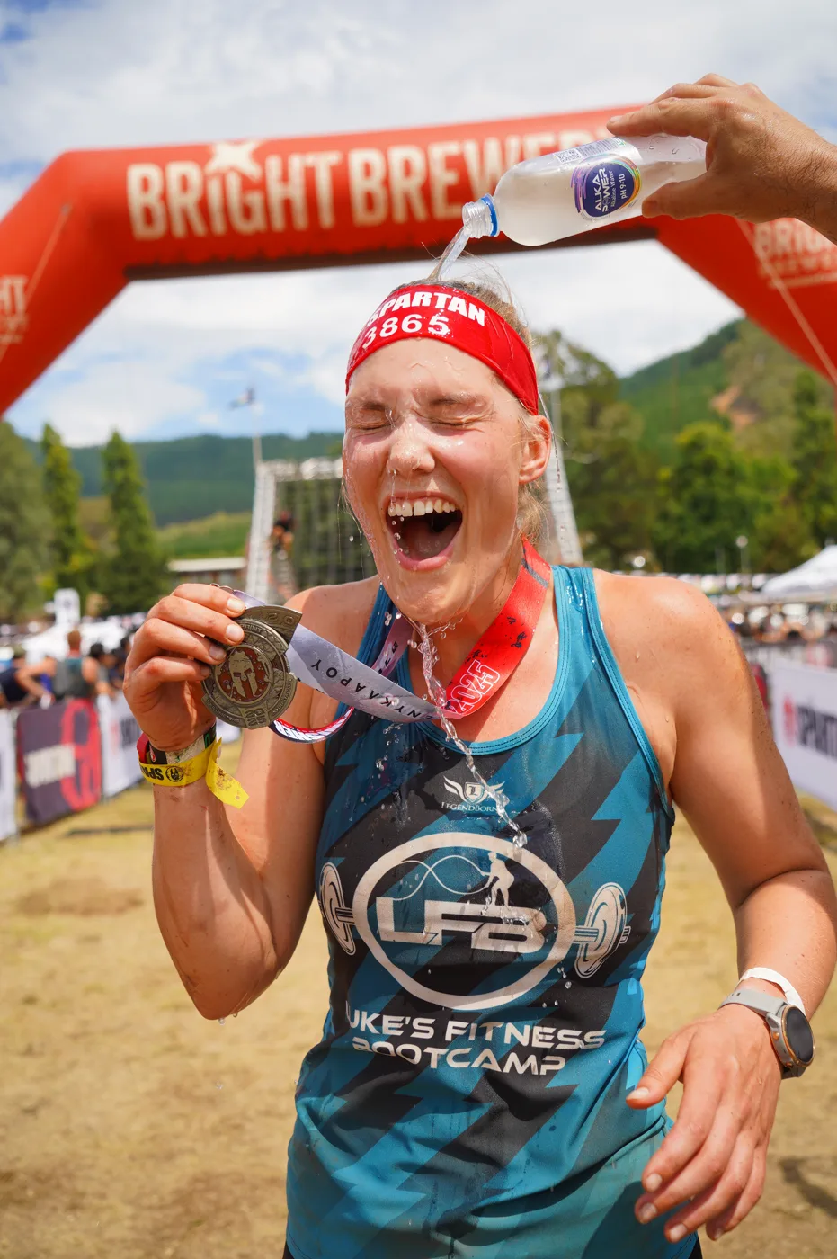 Medal and a huge smile at the Spartan finish.